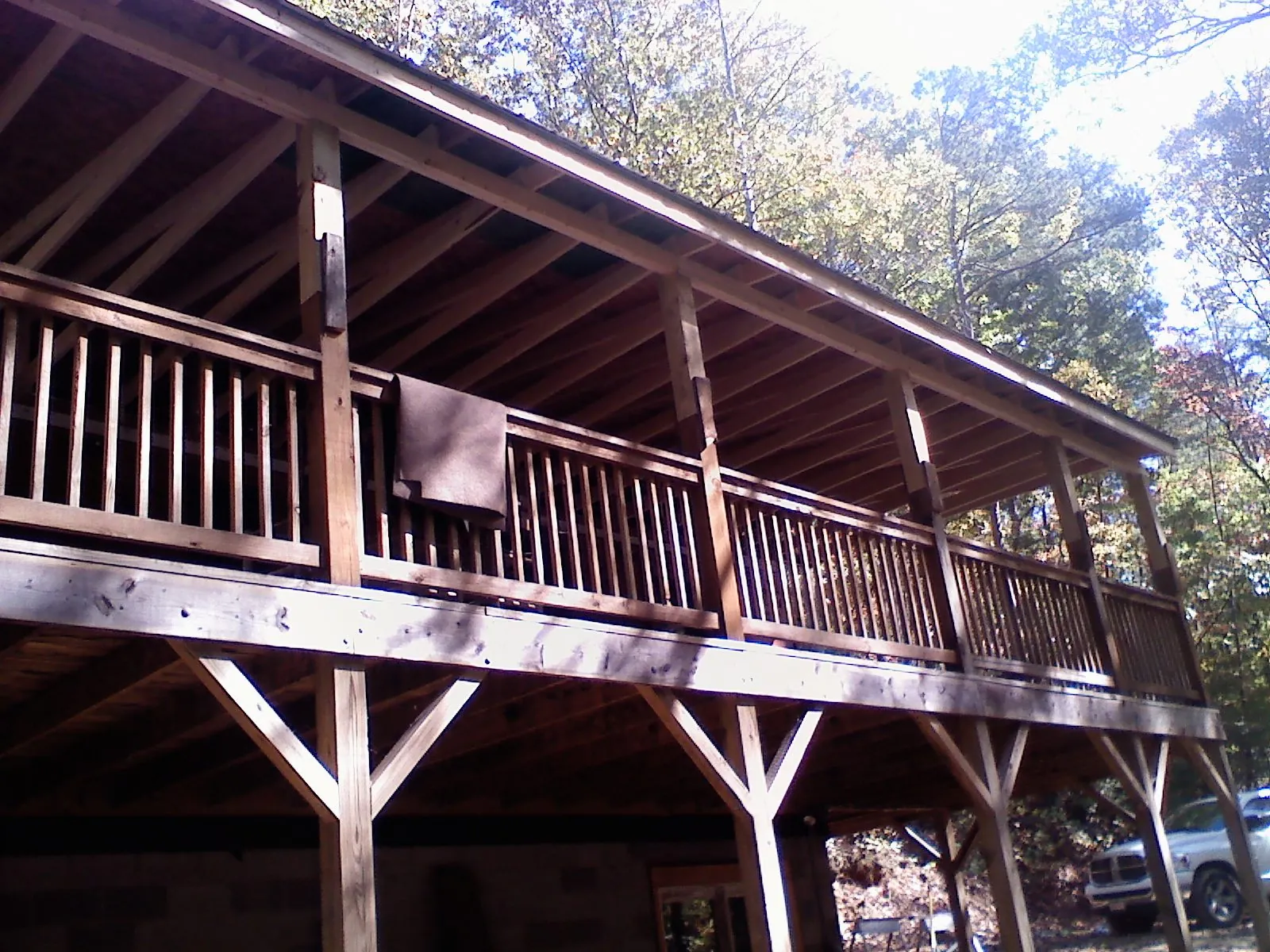 Timber framing under a new elevated porch and deck — Roof Leak Repair in Buffalo Lake by Roofing Brothers